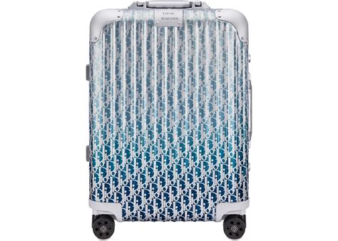 dior 4 wheel cabin suitcase.